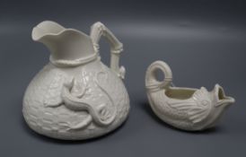 A Parian ware jug with lizard design and a fish sauce boat tallest 15cm