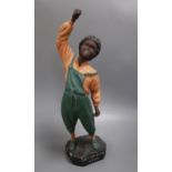 After Steinberg. A painted plaster advertising figure, New Orleans newspaper vendor, height 55cm