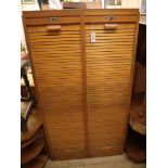A mid century French double tambour filing cabinet H.150cm