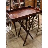 A Victorian mahogany butler's tray on folding stand Tray 77cm