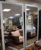 A pair of Italian wall mirrors with rectangular plates H.220cm