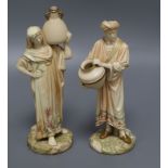 A pair of Worcester blush ivory porcelain figures tallest 27cm