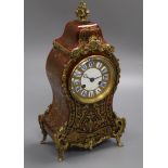 A late 19th century French boulle mantel clock height 30cm