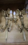 A pair of Georgian style two-light gilded 'eagle' wall brackets, H 78cm