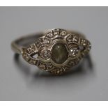 A 750 white metal, aquamarine and diamond set lozenge shaped ring, size K.