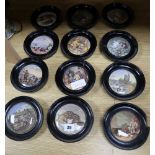 A collection of twelve Victorian Prattware pot lids, framed