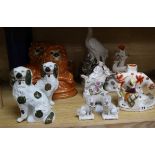 A collection of Victorian and later Staffordshire figures and animals