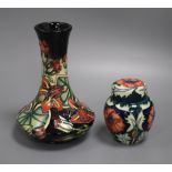 A Moorcroft clematis vase and a poppy jar and cover tallest 20cm