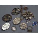 A group of mixed silver and white metal jewellery including a Victorian locket and an antique signet