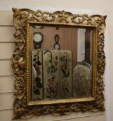 A rectangular Florentine style gilt wall mirror H.65cm