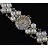 A lady's platinum, iridium, diamond and cultured pearl set Hamilton manual wind cocktail watch,