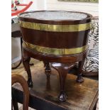 An 18th century mahogany oval brass bound wine cooler W.62cm