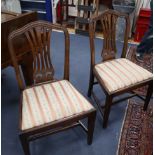 A set eight Hepplewhite style mahogany dining chairs (two with arms)