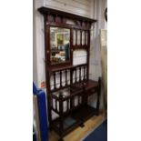 An early 20th century mahogany hall stand W.128cm