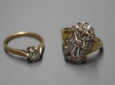 An Art Deco style 18ct gold and diamond pierced tablet ring and 9ct gold illusion-set solitaire