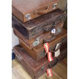 Five vintage leather suitcases largest 56cm
