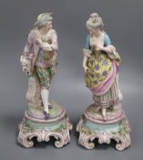 A pair of Continental porcelain figures height 34cm