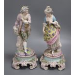 A pair of Continental porcelain figures height 34cm