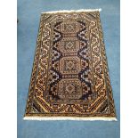 A Belouch style rug 146 x 85cm