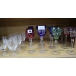 A group of coloured hock glasses and cut glass goblets