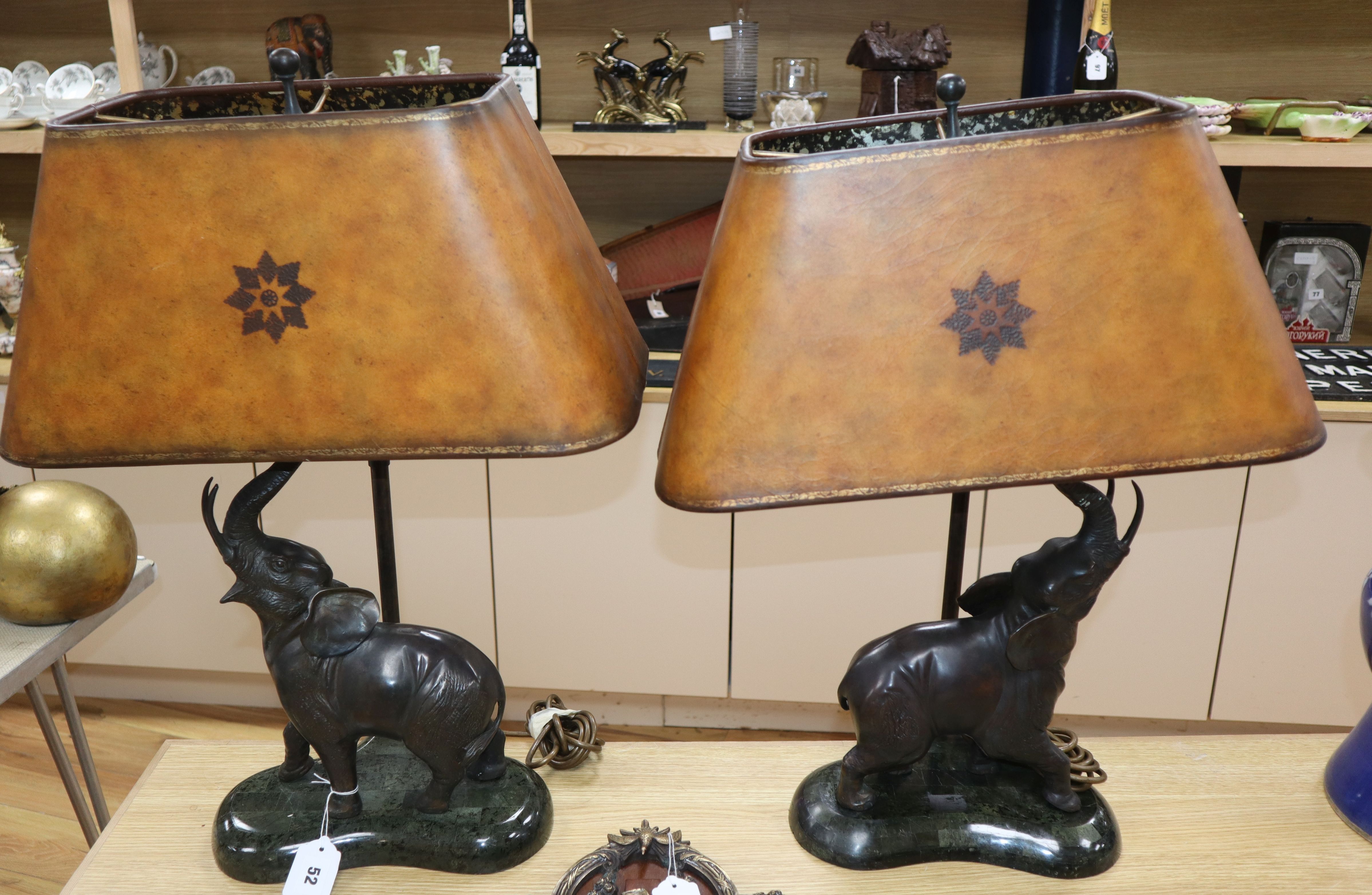 A pair of bronze "elephant" lamps on marble base overall height 66cm