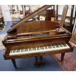 A Challen figured walnut baby grand piano