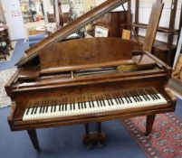 A Challen figured walnut baby grand piano