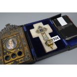 A cloisonne crucifix, a miniature of Madonna and a bible