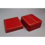 Two Cartier boxes