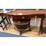 A George III mahogany serpentine front serving table W.146cm
