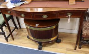 A George III mahogany serpentine front serving table W.146cm