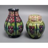 A Moorcroft violet vase and a lidded jar vase 14cm