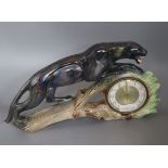 A French ceramic panther mantel timepiece height 23cm