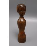 An 18th century primitive carved doll with stamp on base height 25cm