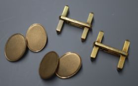 One pair of 9ct. gold cufflinks and one pair of 18ct gold cufflinks.