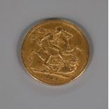 An Edward VII 1902 gold full sovereign.