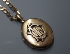 An Edwardian yellow metal oval locket, together with a later 375 curblink chain.