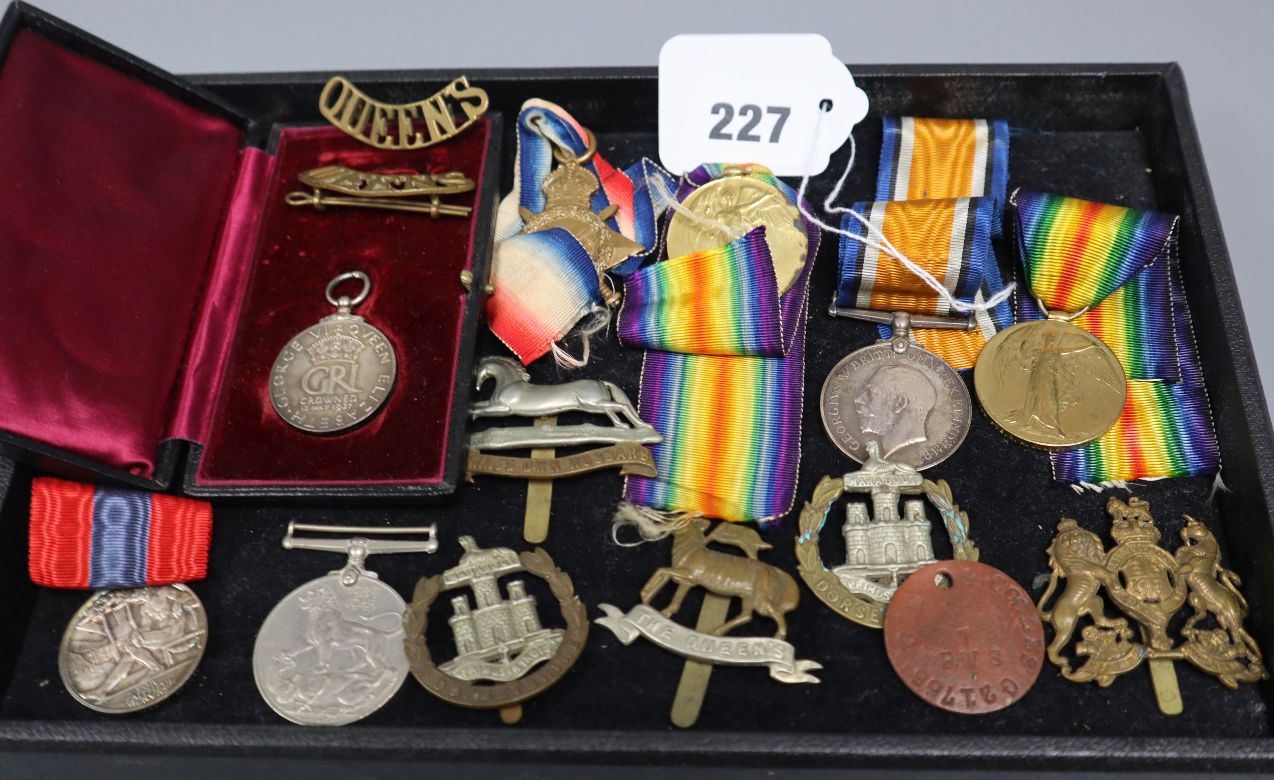 A group of assorted medals and cap badges including 1914-15 star 14953 Pte A.Campbell Sco.RifVictory