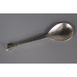 A modern planished silver spoon by the Guild of Handicrafts, London, 1990, 14cm.