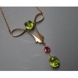 A 15ct gold, peridot and pink tourmaline openwork pendant necklace, marked 'Grice', overall drop