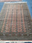 A Bokhara style rug 240 x 155cm