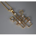 An 18K gold and diamond modernist pendant on 9ct gold flattened link chain, the pendant formed as an