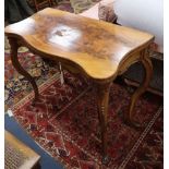 A 19th century French walnut serpentine folding tea table W.88cm