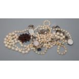 Three assorted cultured pearl necklaces, a Victorian yellow metal and garnet brooch, a 9ct ring