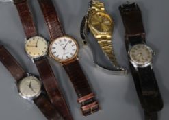 Five assorted gentleman's wrist watches including Timex and retailed by Camerer Cuss & Co.