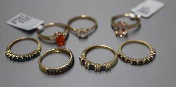 Seven 9ct gem-set rings, including fire opal and morganite examples