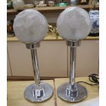 A pair of chrome/frosted glass lamps height 59cm