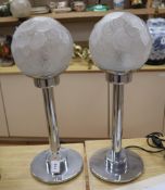 A pair of chrome/frosted glass lamps height 59cm