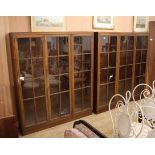 A near pair of mahogany glazed bookcases Larger 160cm