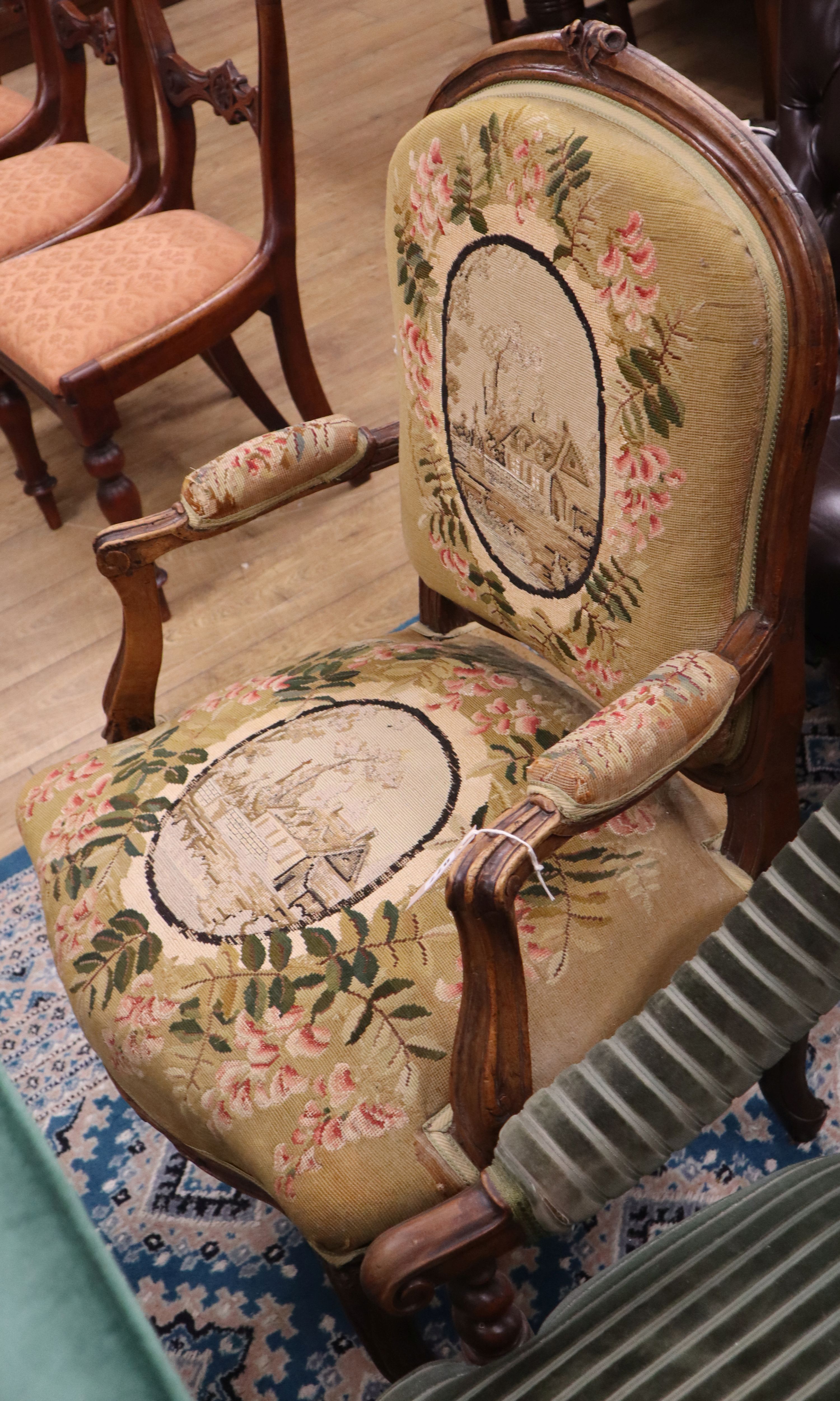 A French walnut tapestry seated elbow chair